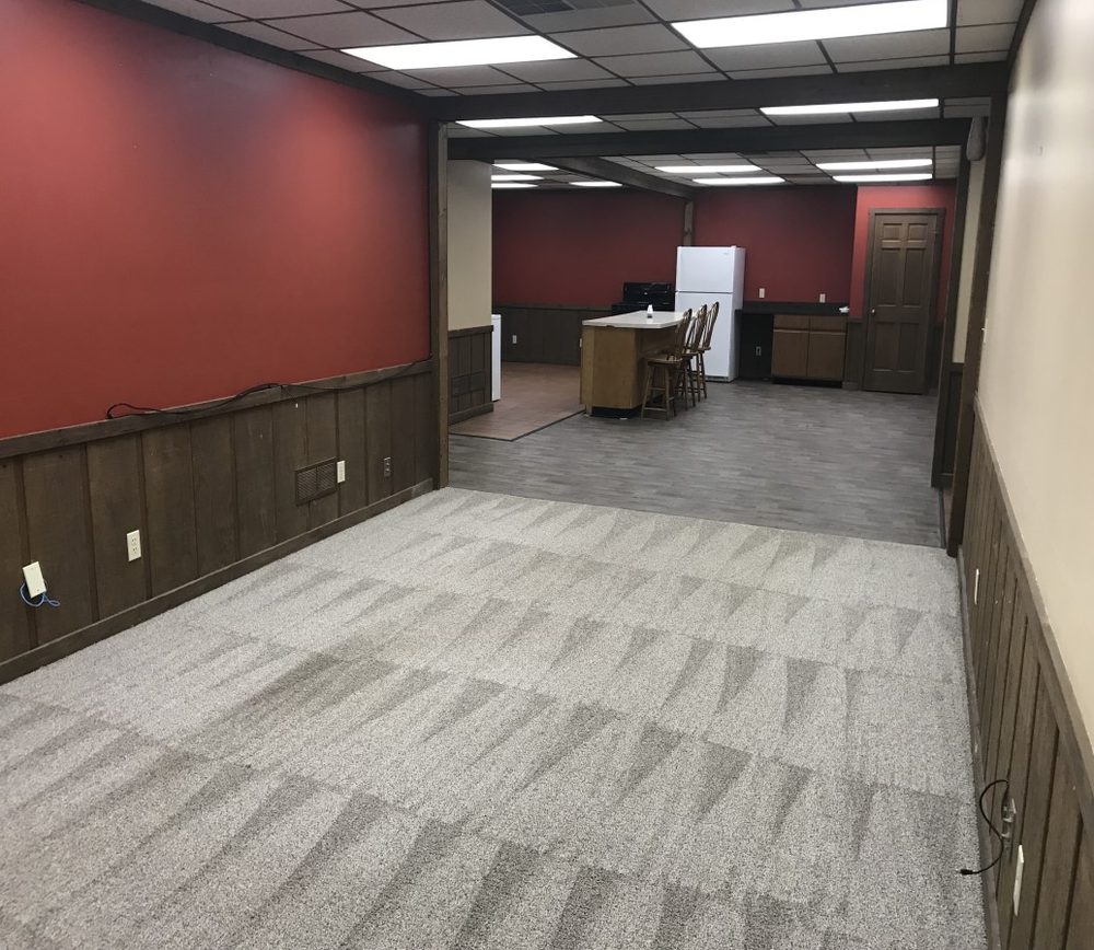 Finished office interior with carpet and wainscoting